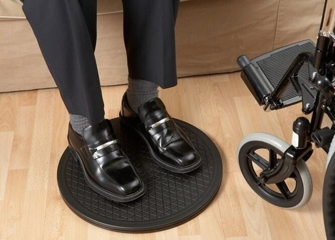 Rotary transfer for the transfer of a disabled person