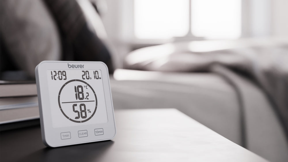 Beurer HM 22 thermo hygrometer; displays temperature relative humidity date and time; timer function; sensor buttons