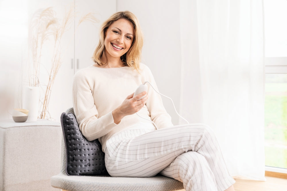 Beurer HK 48 Cosy Heat Pad; 3 temperature settings; auto switch-off after 90 min; washable on 30°; reversable cushion; with inner pad; removable switch; fleece fibre; 40(L)x30(W) cm