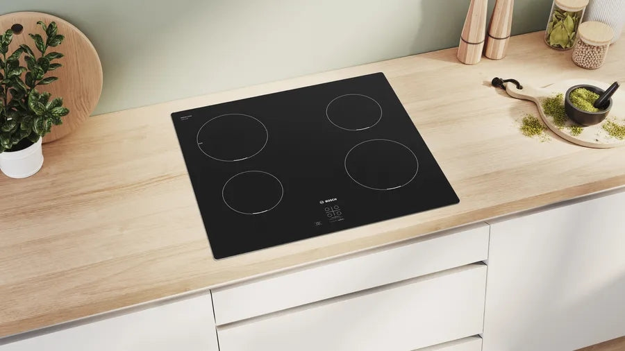 Bosch PUG611AA5E SER2 Induction hob 60 cm 4 zones surface mount without frame Black - Плотове<<<BOSCH