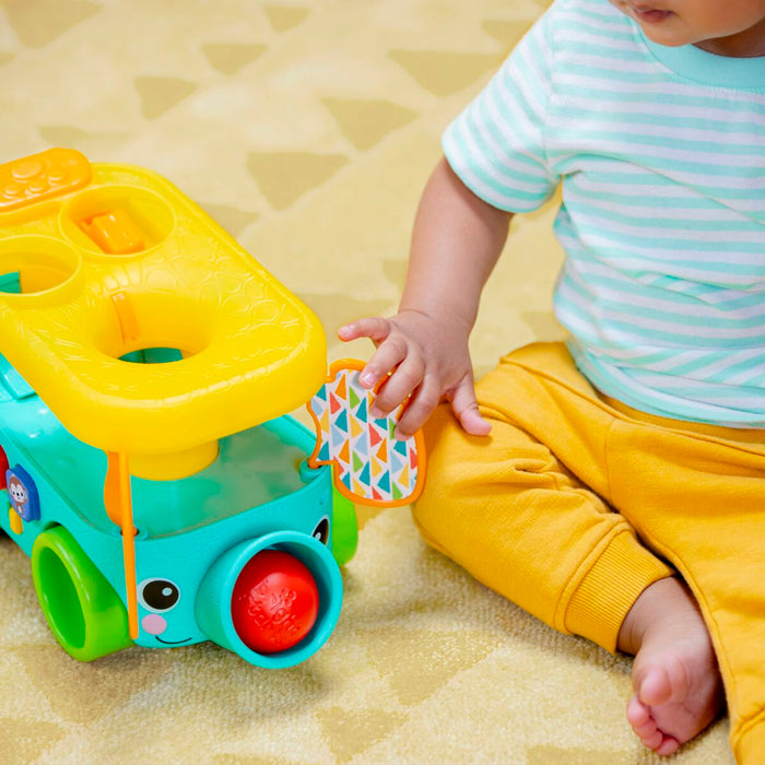 Pull-along toy Bright Starts Pop & Roll Safari Bus