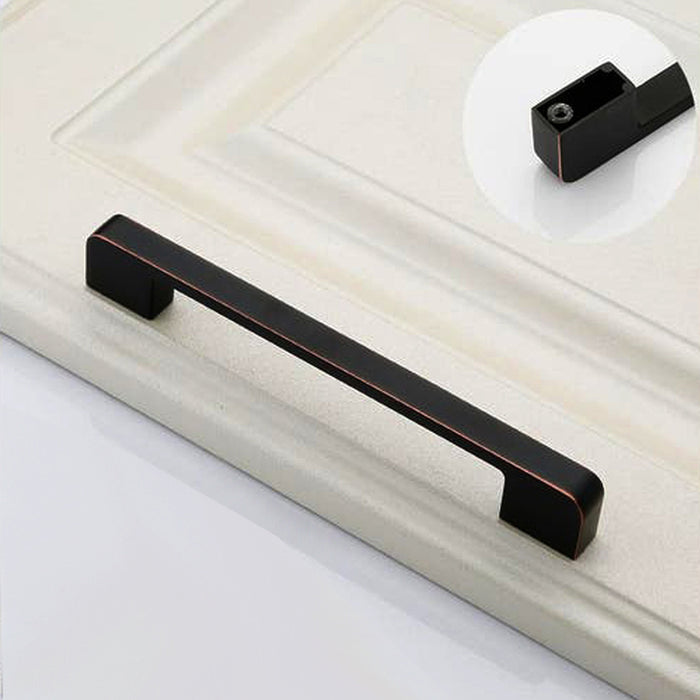 FURNITURE HANDLE MATTE BLACK WITH COPPER EDGE 128 MM EVO LINE 7038