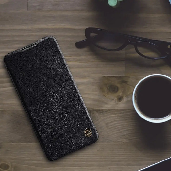 Nillkin Qin leather holster case for Xiaomi Redmi Note 9T 5G black - Cell phone cases and covers<<<HurtelXML
