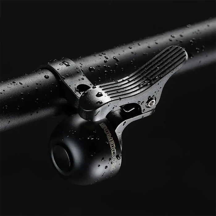 Rockbros 34210007001 bicycle bell for the left side of the handlebar - black - Sport products<<<HurtelXML