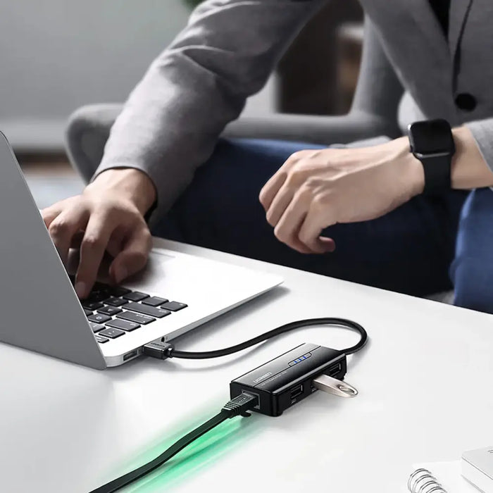Ugreen 20264 RJ45 / USB-A 10/100Mbps HUB network adapter 3x USB-A 2.0 - black - USB hubs<<<HurtelXML