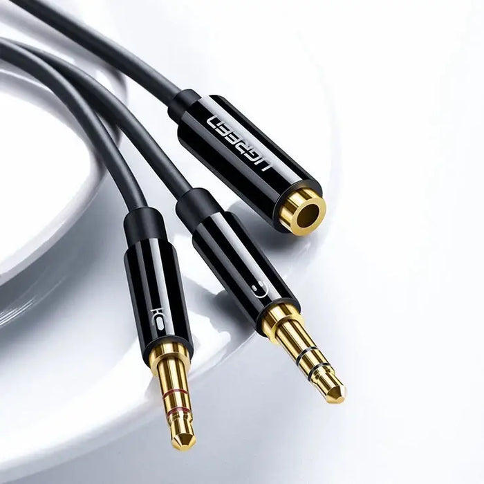 Ugreen AUX splitter cable 3.5 mm mini jack (female) - 2x 3.5 mm mini jack (male - microphone and headphones) black