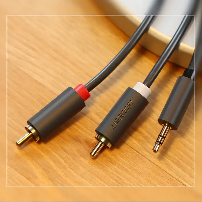 Ugreen AV102 10511 cable 3.5 mm mini jack (male) / 2RCA (male) 1.5m - gray - Audio cables<<<HurtelXML